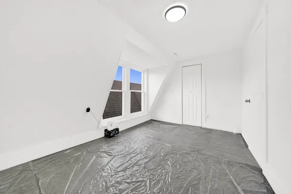 an empty room with a window
