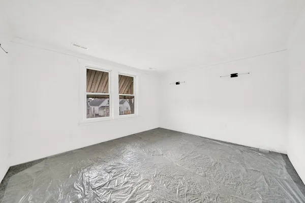 a view of an empty room with window