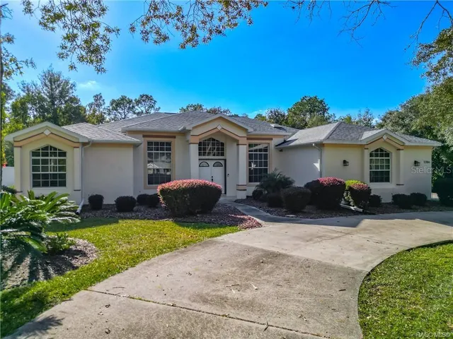 a view of a house with a patio