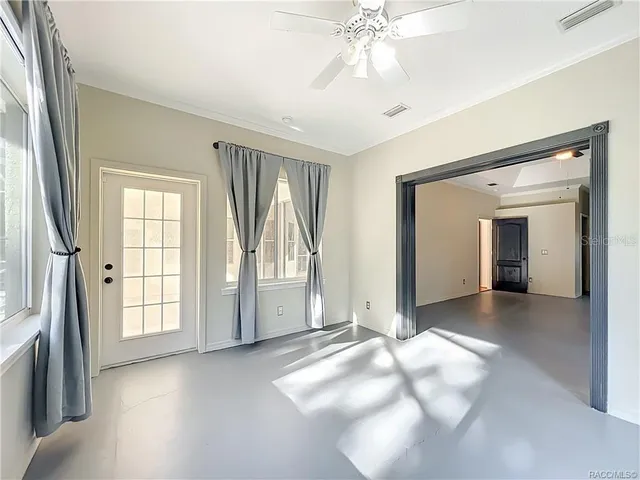 a spacious bathroom with a granite countertop sink and a mirror