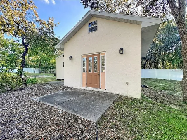 a house view with a outdoor space