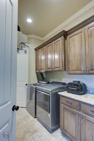 a view of a hallway with a chandelier fan