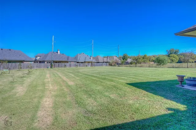 a kitchen with a sink and a refrigerator