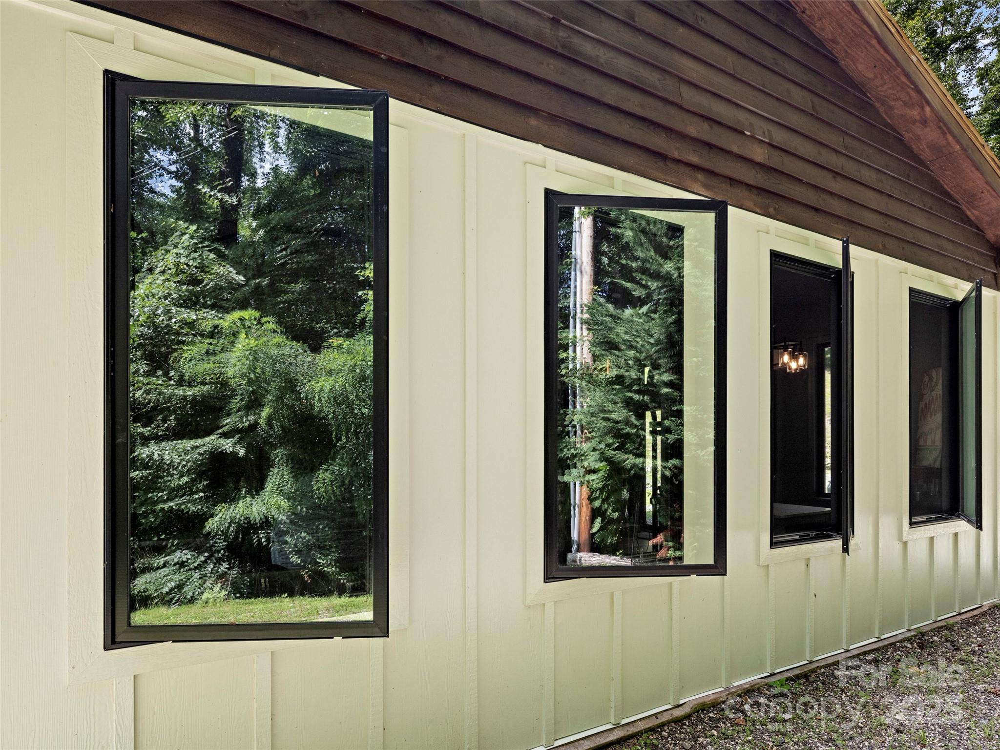 44 Sutton Knob Road Candler, NC 28715 - Photo 26 of 41 a view of a front door and wooden floor