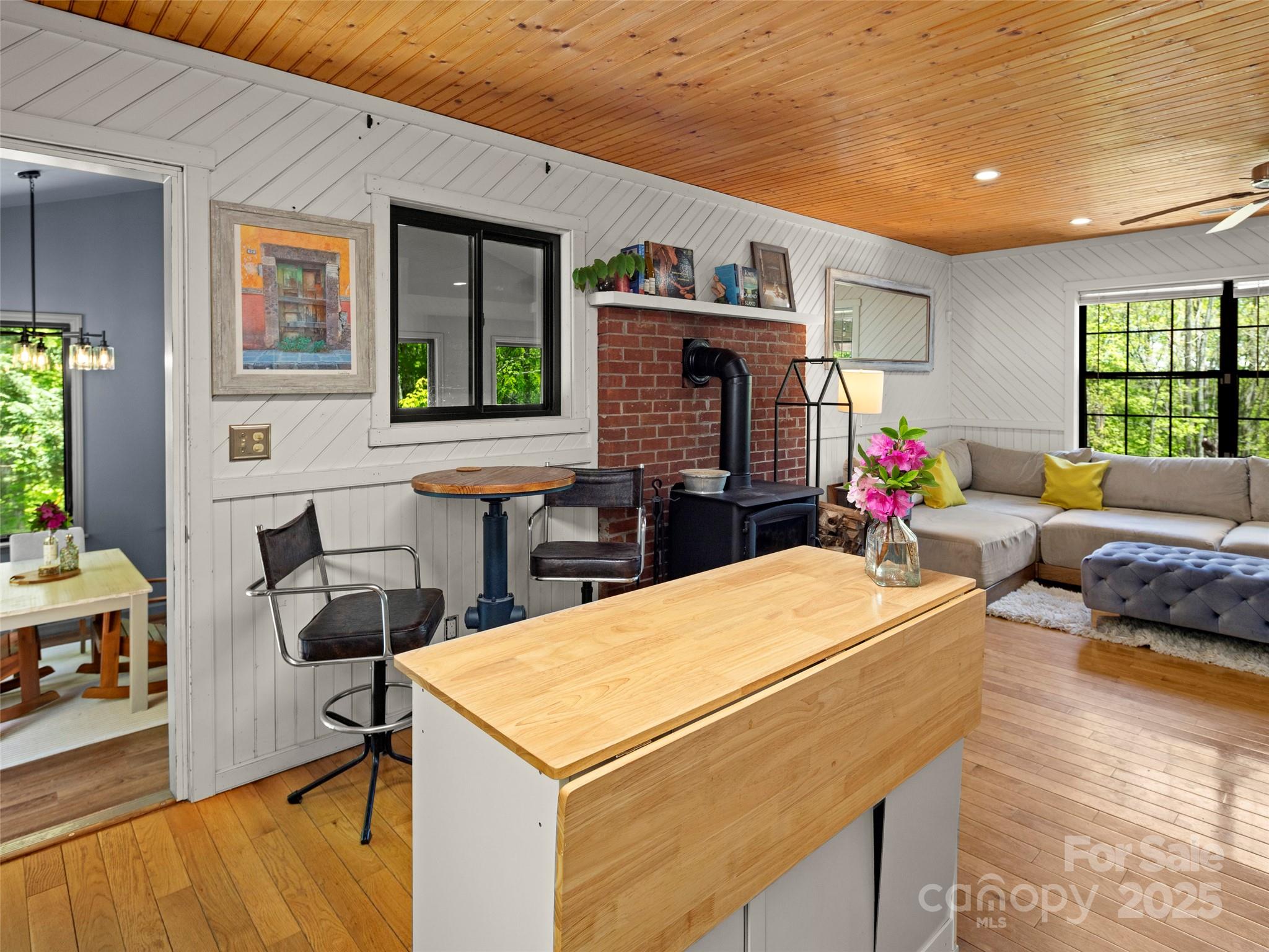 44 Sutton Knob Road Candler, NC 28715 - Photo 8 of 41 a living room with furniture and a fireplace