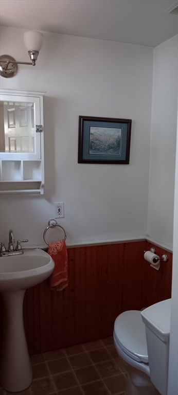58 Oak Street Boston, MA 02136 - Photo 13 of 26 a bathroom with a sink a toilet and a mirror