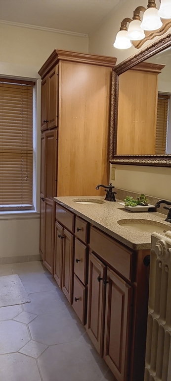 58 Oak Street Boston, MA 02136 - Photo 22 of 26 a bathroom with a granite countertop sink a mirror and a bathtub