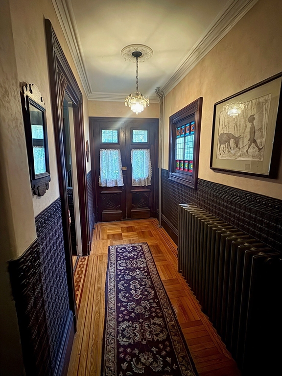 58 Oak Street Boston, MA 02136 - Photo 5 of 26 a hallway with a large window and couch