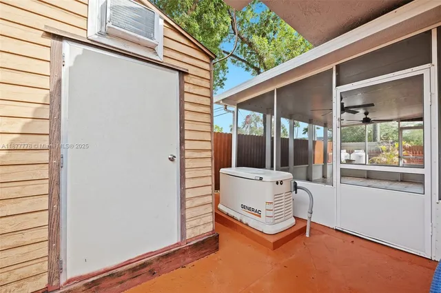 a balcony with view of yard