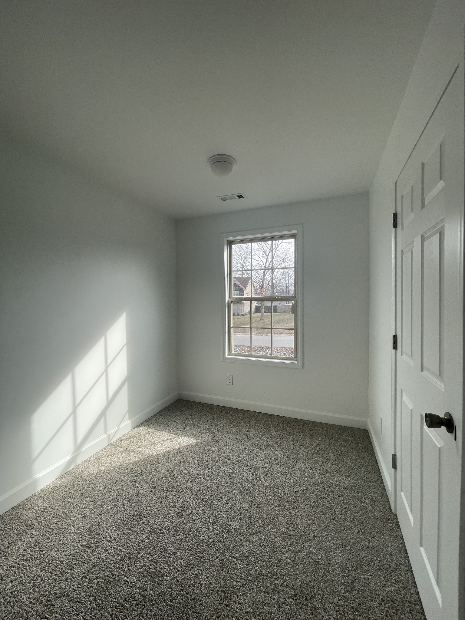 1501 Trainer Road Clarksville, TN 37042 - Photo 13 of 19 an empty room with windows