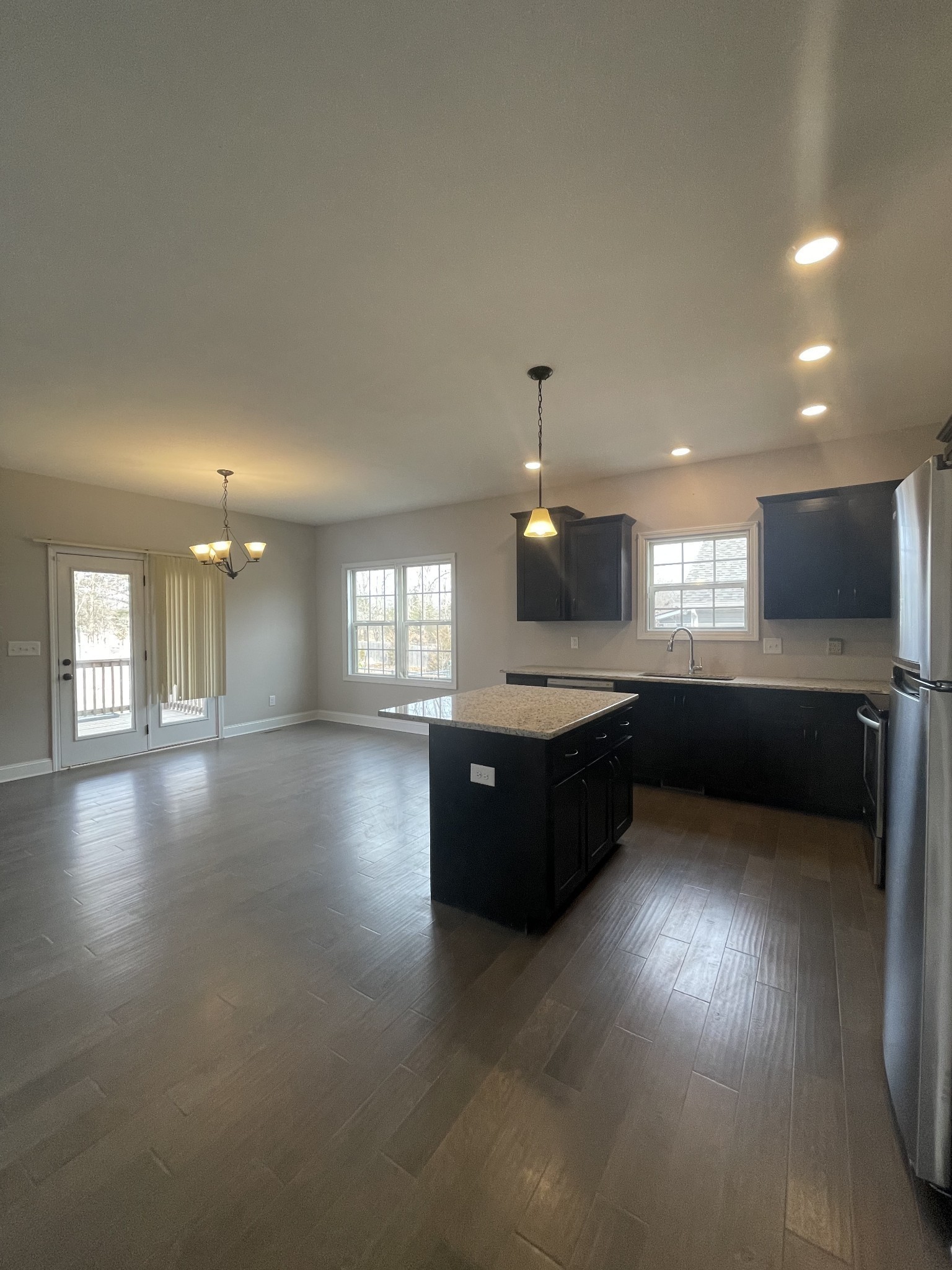 1501 Trainer Road Clarksville, TN 37042 - Photo 4 of 19 a large kitchen with a large counter top and stainless steel appliances