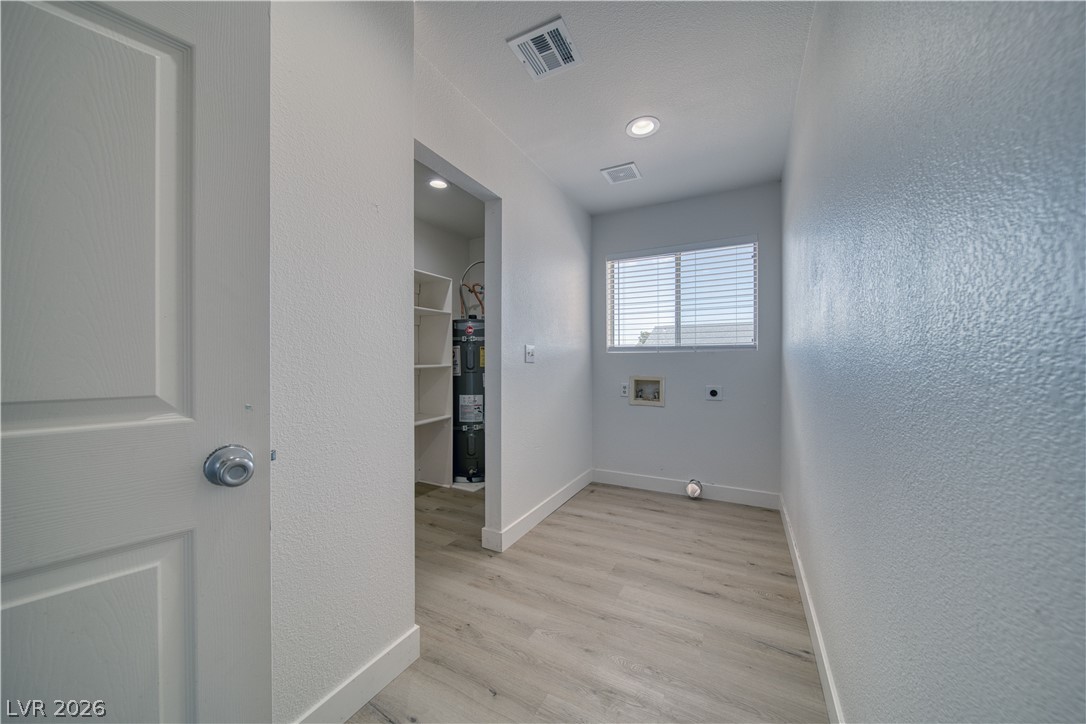 851 Lone Pine Road Pahrump, NV 89048 - Photo 11 of 25 This dedicated laundry space offers convenience and functional design.