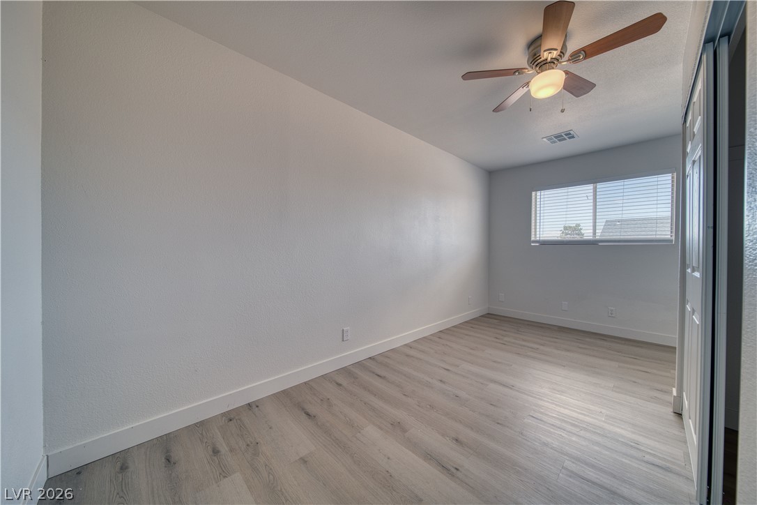 851 Lone Pine Road Pahrump, NV 89048 - Photo 14 of 25 This spacious room features elegant flooring and abundant natural light.