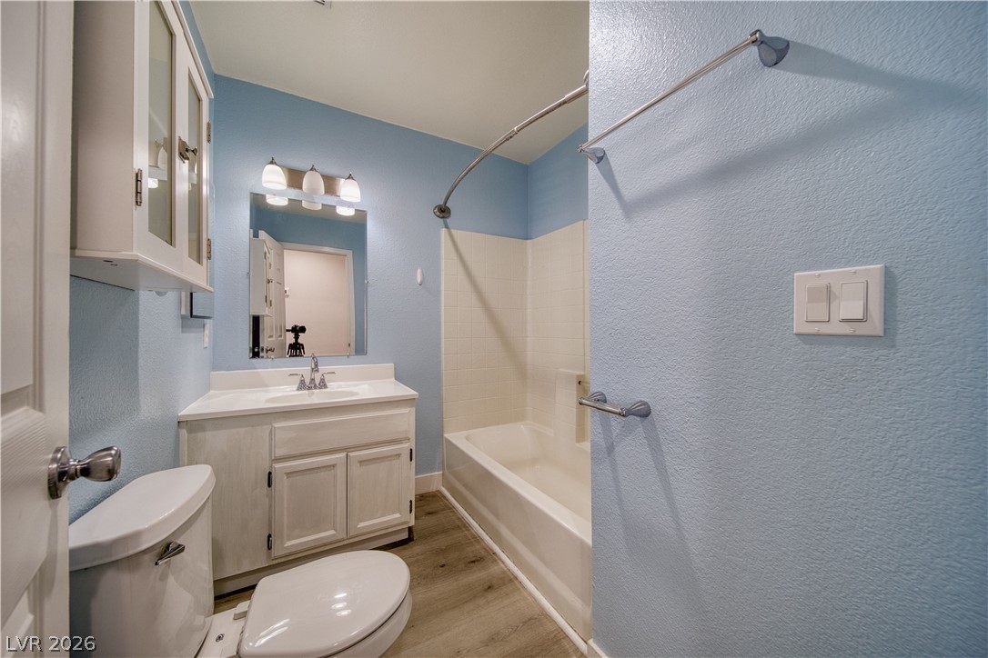 851 Lone Pine Road Pahrump, NV 89048 - Photo 16 of 25 This bathroom features a contemporary vanity and a functional tub-shower combination.