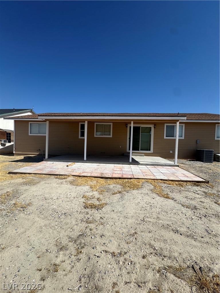 851 Lone Pine Road Pahrump, NV 89048 - Photo 3 of 25 This outdoor space offers a paved walkway, perfect for enjoying the open air.