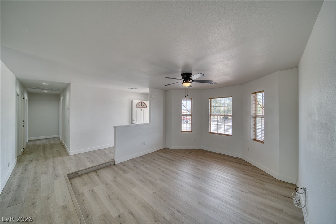 851 Lone Pine Road Pahrump, NV 89048 - Photo 8 of 25 This bright and airy interior features versatile flooring and abundant natural light.