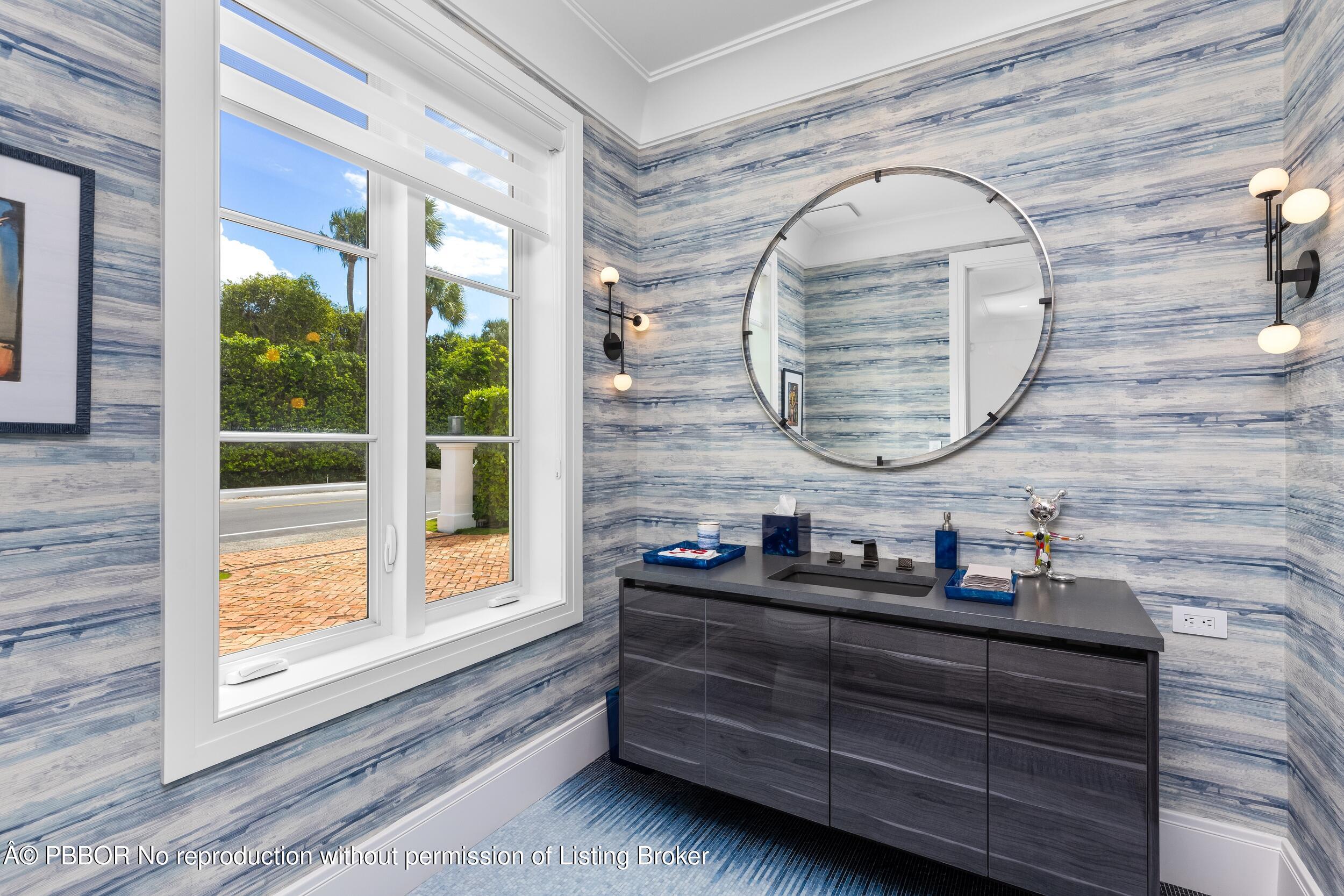 201 Banyan Road Palm Beach, FL 33480 - Photo 20 of 42 a room with a bench and windows