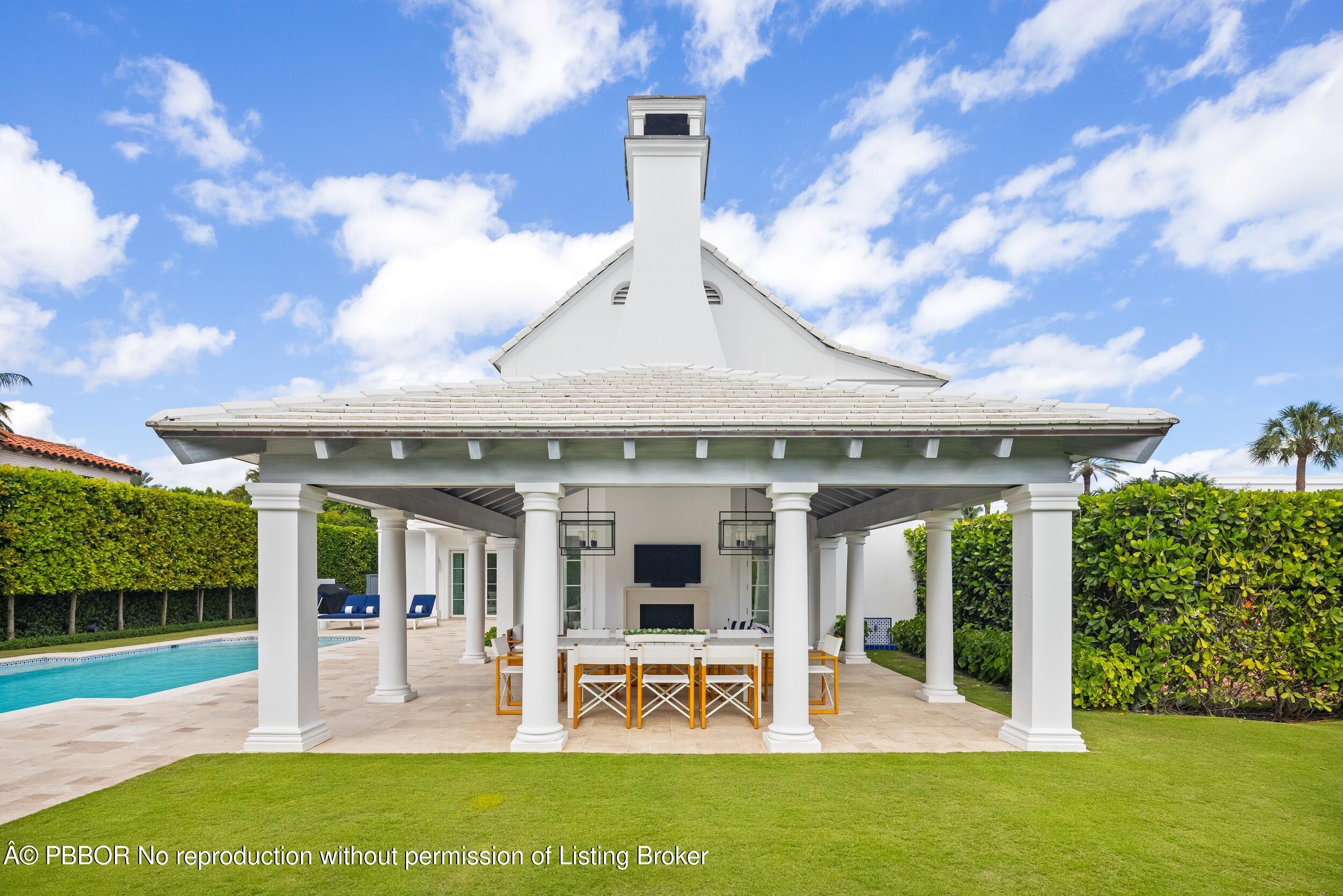 201 Banyan Road Palm Beach, FL 33480 - Photo 33 of 42 a view of a house with backyard porch and sitting area