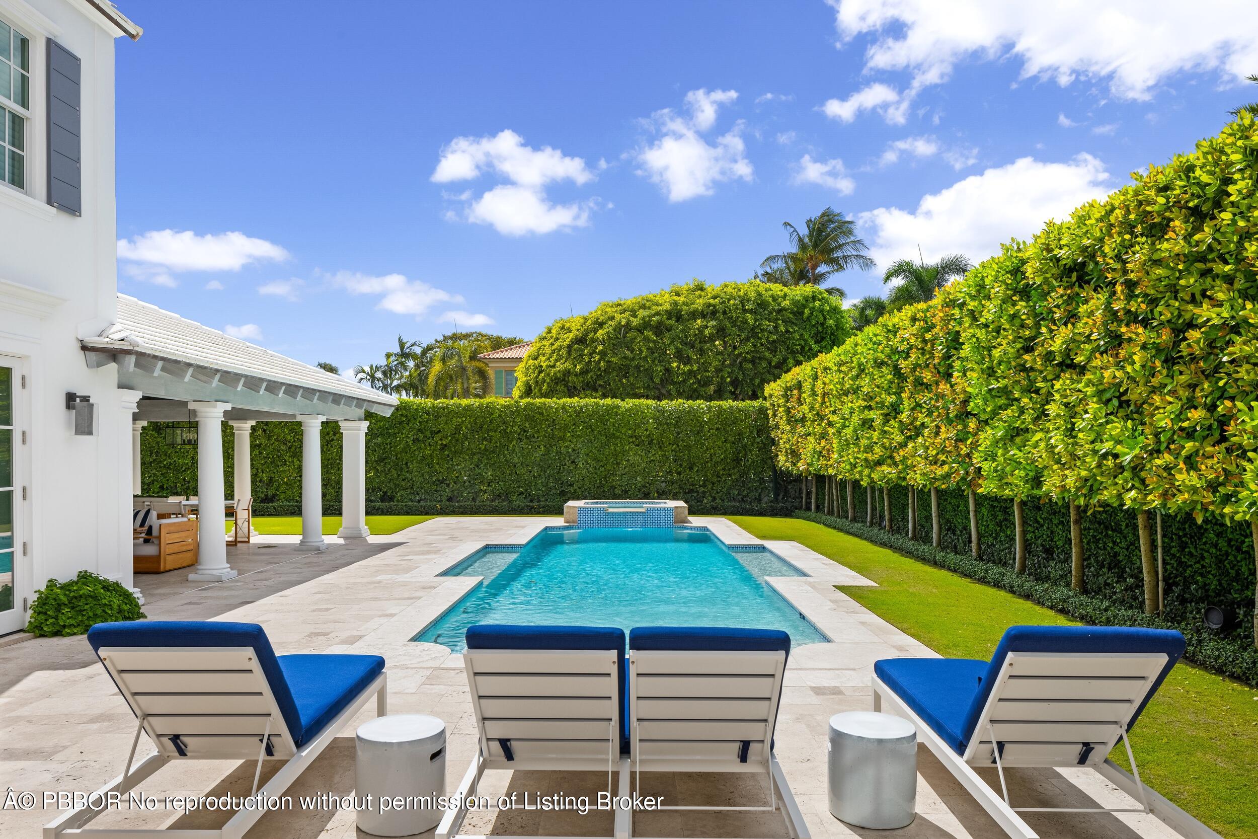 201 Banyan Road Palm Beach, FL 33480 - Photo 37 of 42 a view of a patio with swimming pool