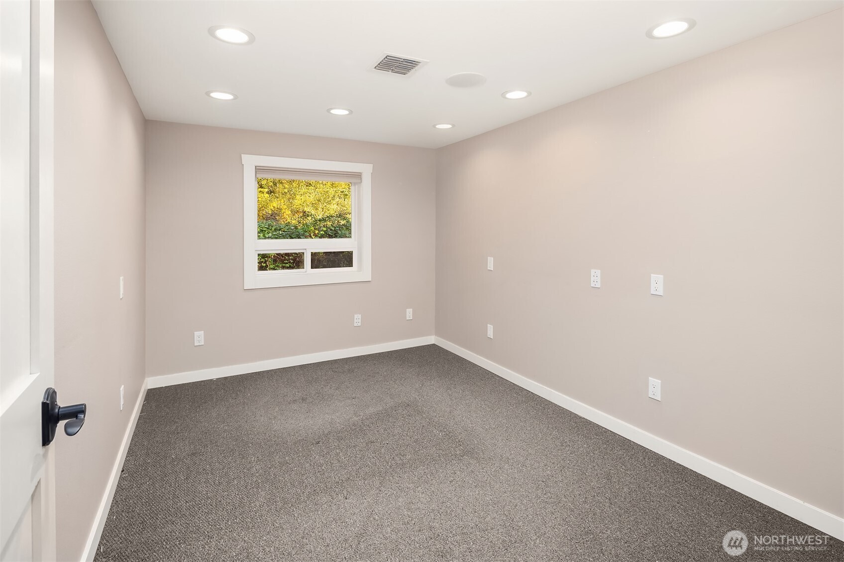 19007 Yew Way Snohomish, WA 98296 - Photo 18 of 27 an empty room with windows