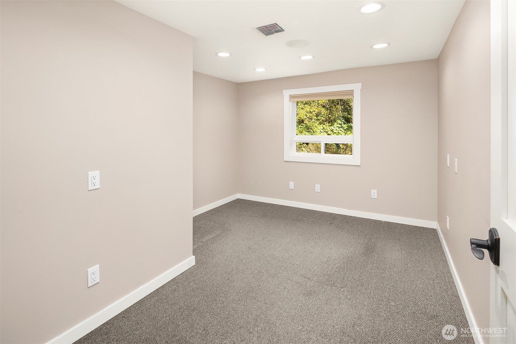 19007 Yew Way Snohomish, WA 98296 - Photo 20 of 27 an empty room with windows