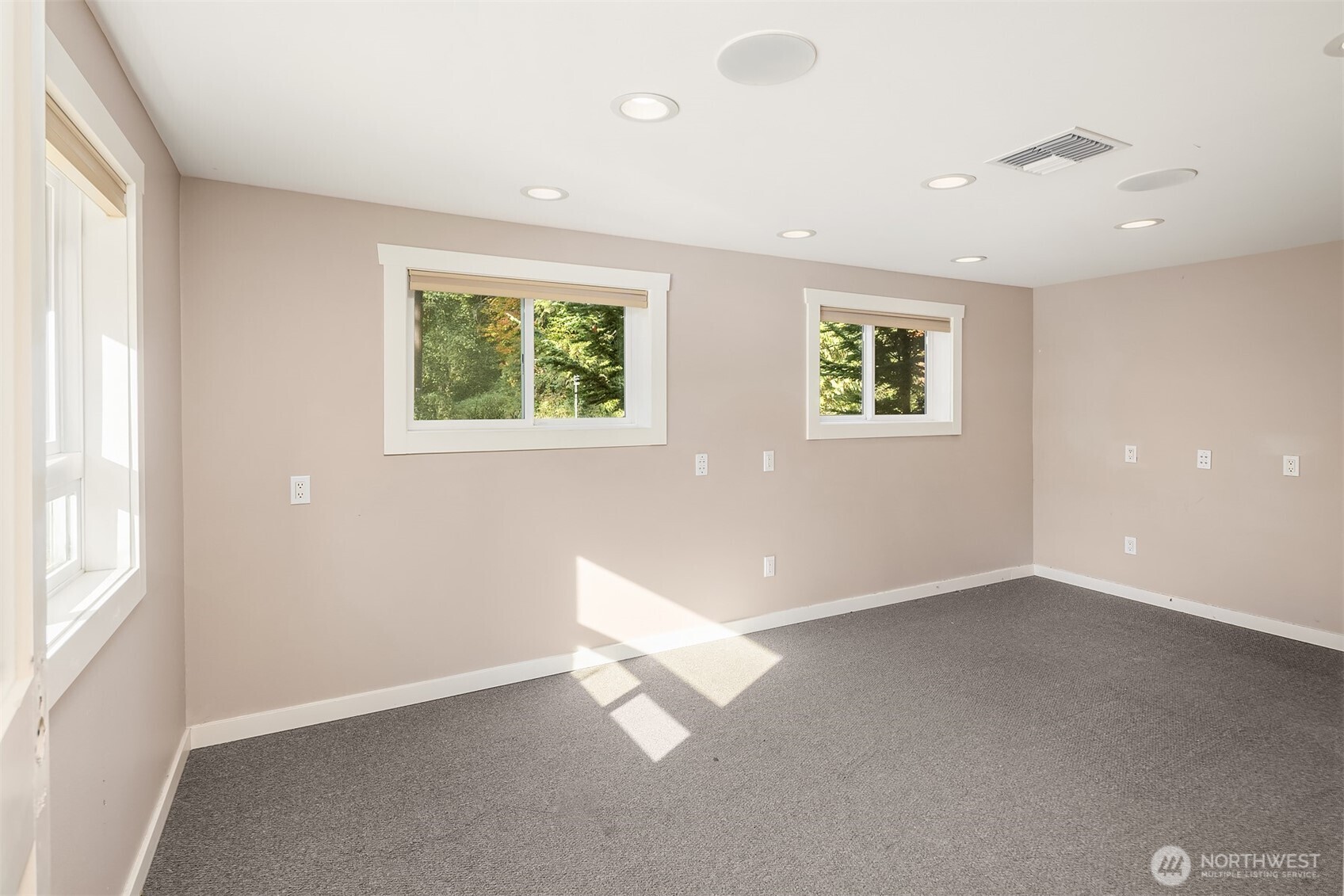 19007 Yew Way Snohomish, WA 98296 - Photo 22 of 27 an empty room with windows