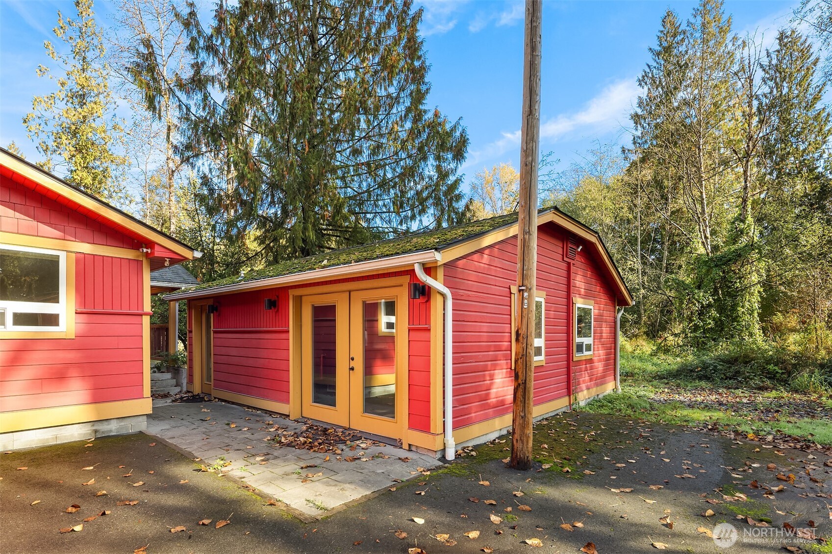 19007 Yew Way Snohomish, WA 98296 - Photo 25 of 27 a view of a house with backyard and trees