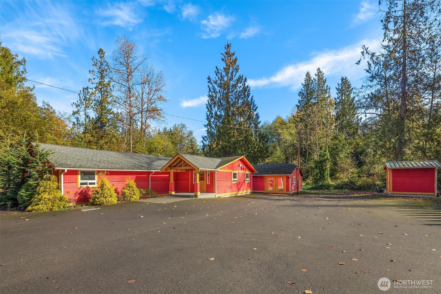 19007 Yew Way Snohomish, WA 98296 - Photo 3 of 27 a view of street with large trees