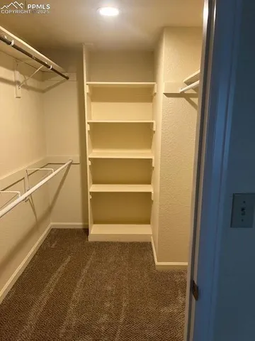 a storage room with wooden floor