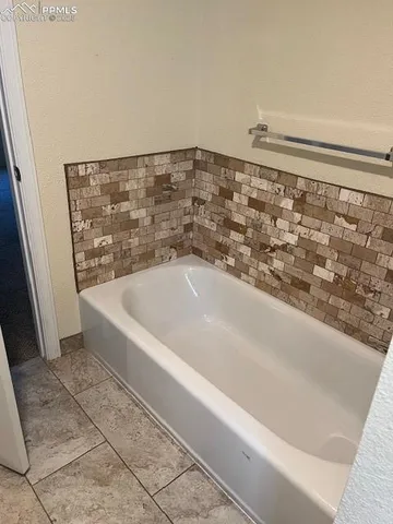 a bathroom with a bathtub