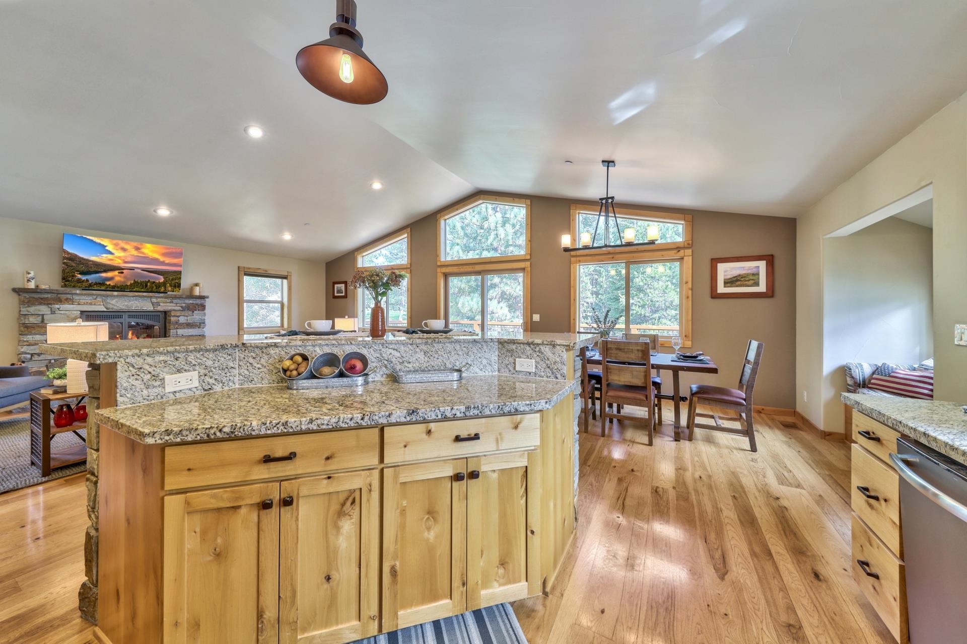 14152 Ski View Loop Truckee, CA 96161 - Photo 12 of 28 a kitchen with counter space dining table and chairs
