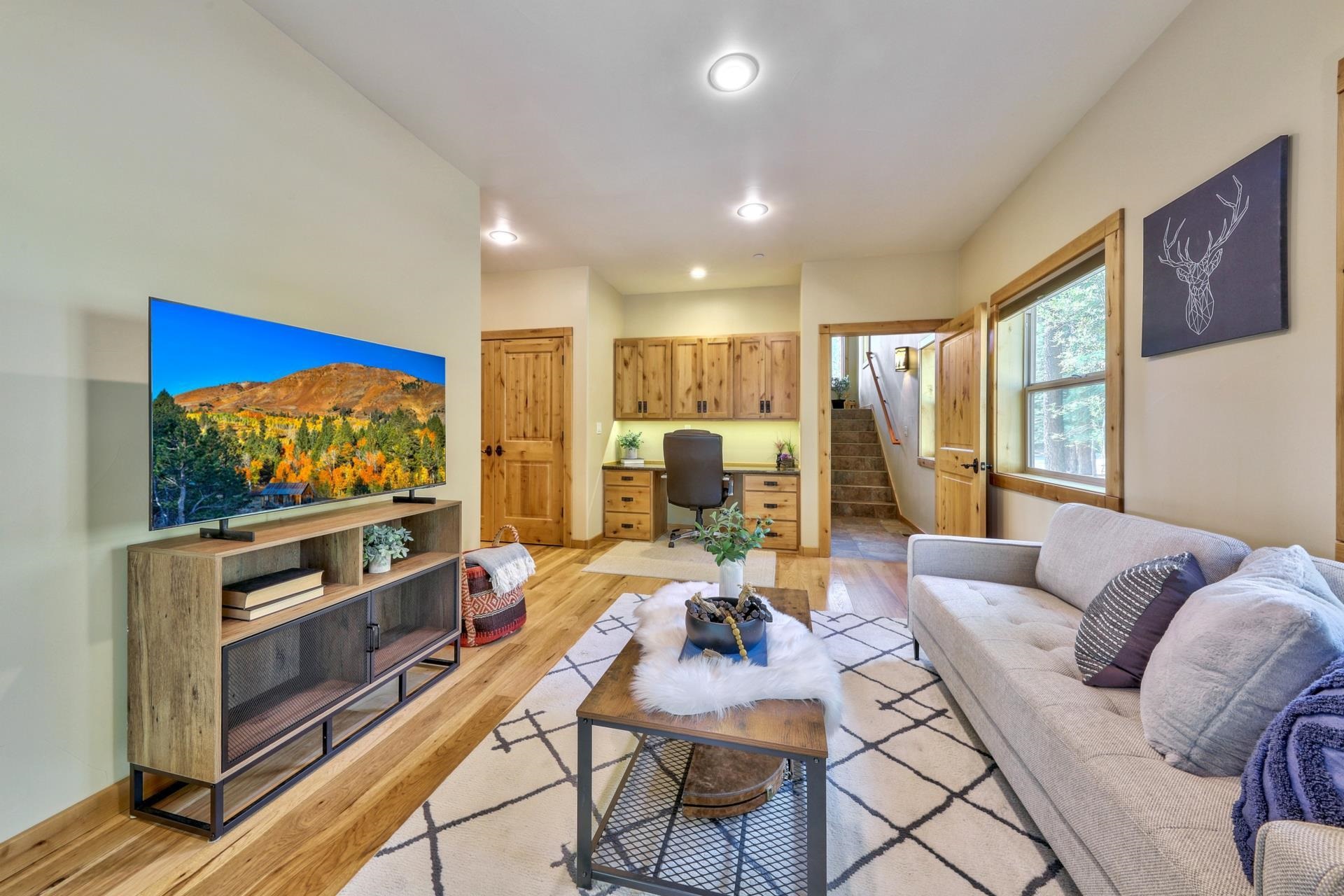 14152 Ski View Loop Truckee, CA 96161 - Photo 17 of 28 a living room with furniture and a flat screen tv
