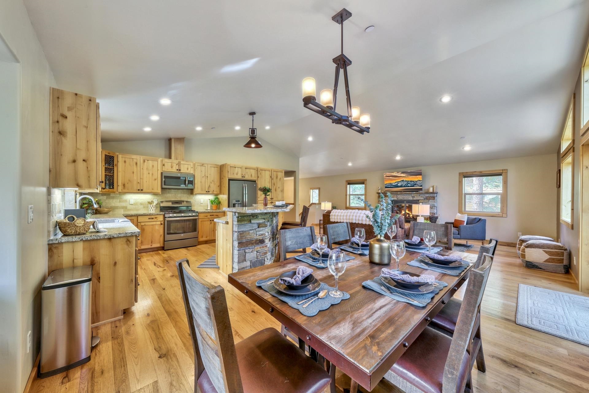 14152 Ski View Loop Truckee, CA 96161 - Photo 9 of 28 a large kitchen with a table and chairs