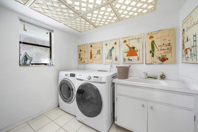 a view of a backyard with sitting area