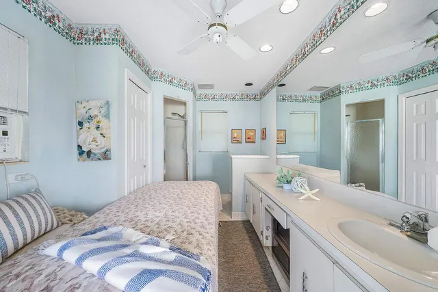 a view of backyard with swimming pool and outdoor seating