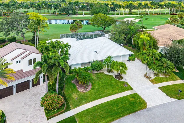 a view of a swimming pool with a garden