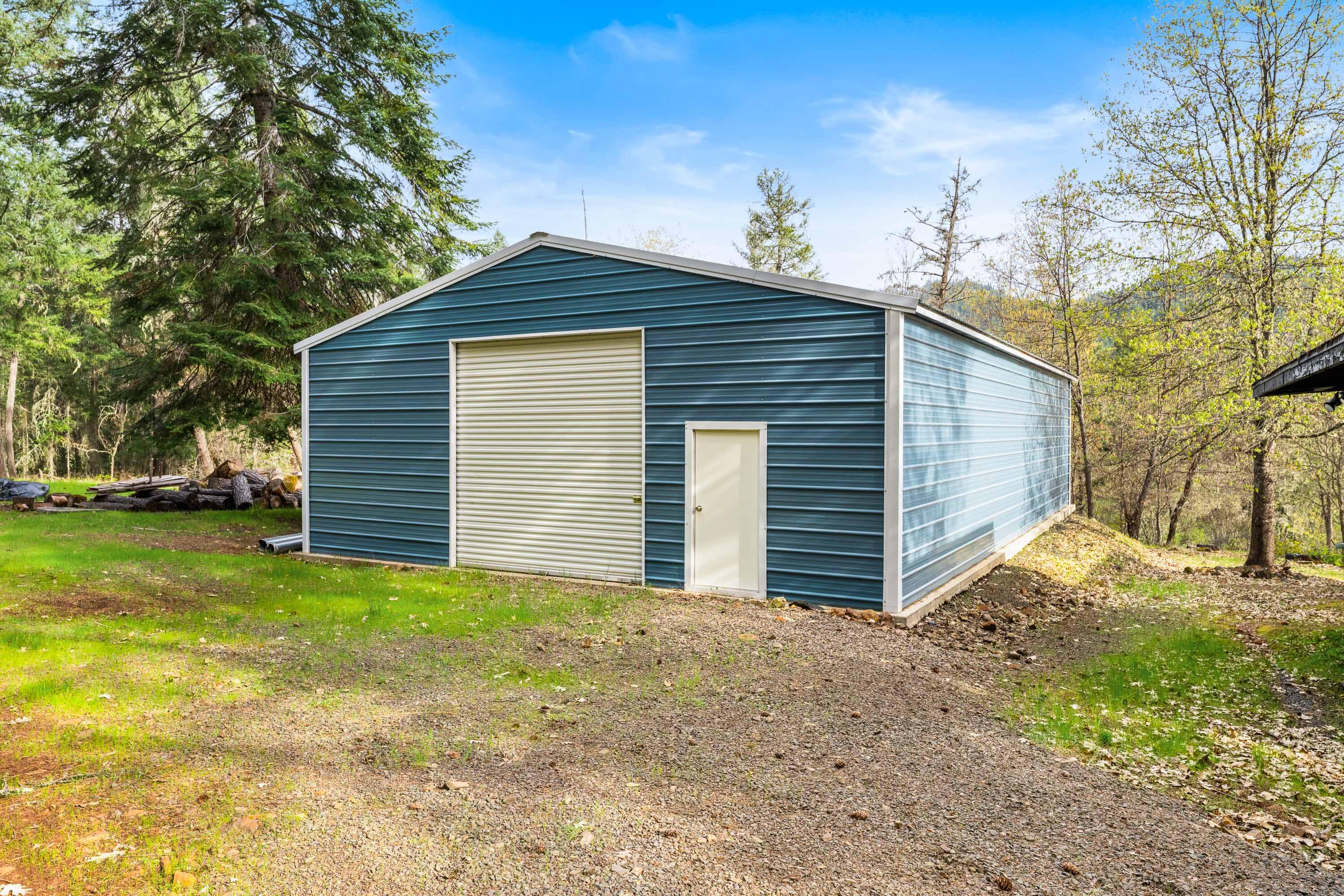 7201 Crowfoot Road Trail, OR 97541 - Photo 46 of 56 a view of a house with a yard
