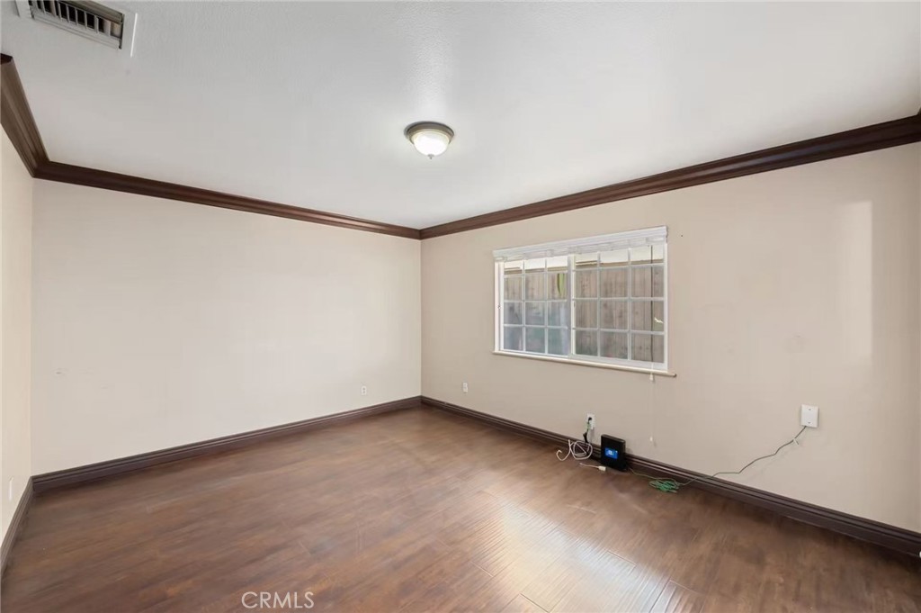 10566 Calabash Avenue Fontana, CA 92337 - Photo 5 of 20 an empty room with a window