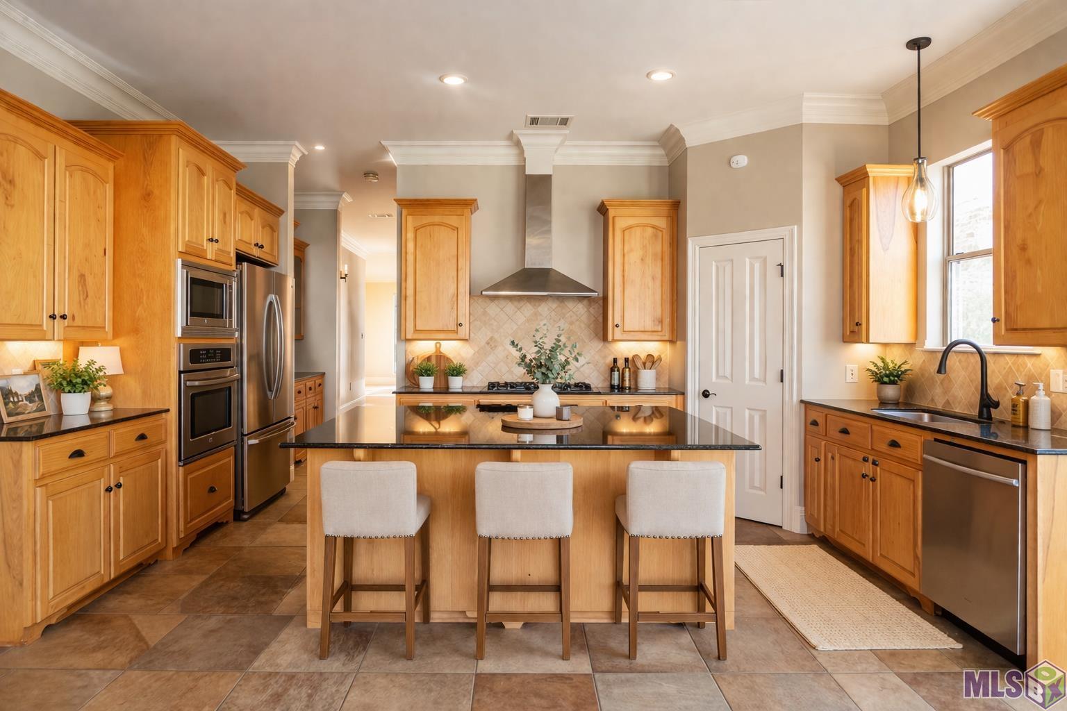 1642 Ruelle De Grace Drive Baton Rouge, LA 70810 - Photo 9 of 57 Kitchen Breakfast Area Staged