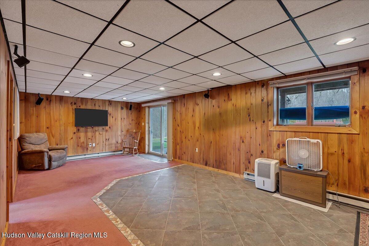 28 Hennett Road Valatie, NY 12184 - Photo 22 of 40 a room with furniture