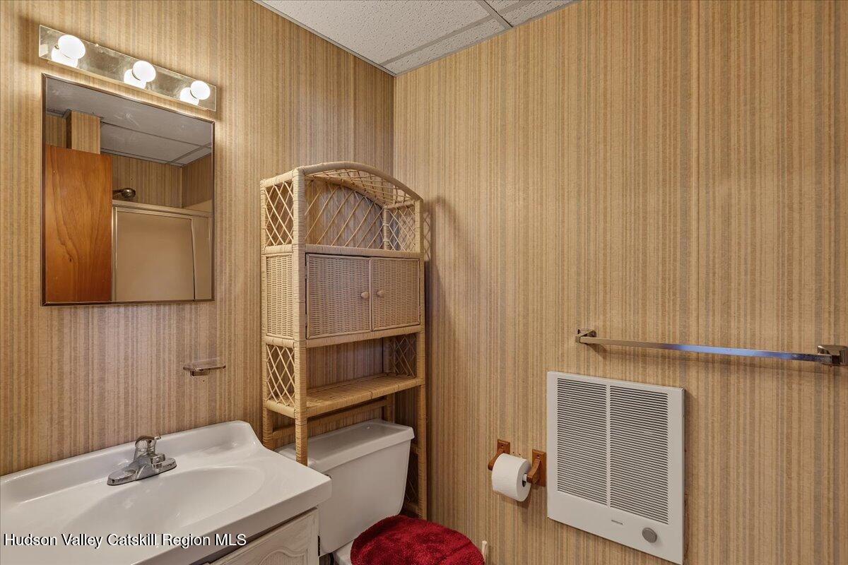 28 Hennett Road Valatie, NY 12184 - Photo 24 of 40 a bathroom with a sink toilet and shower