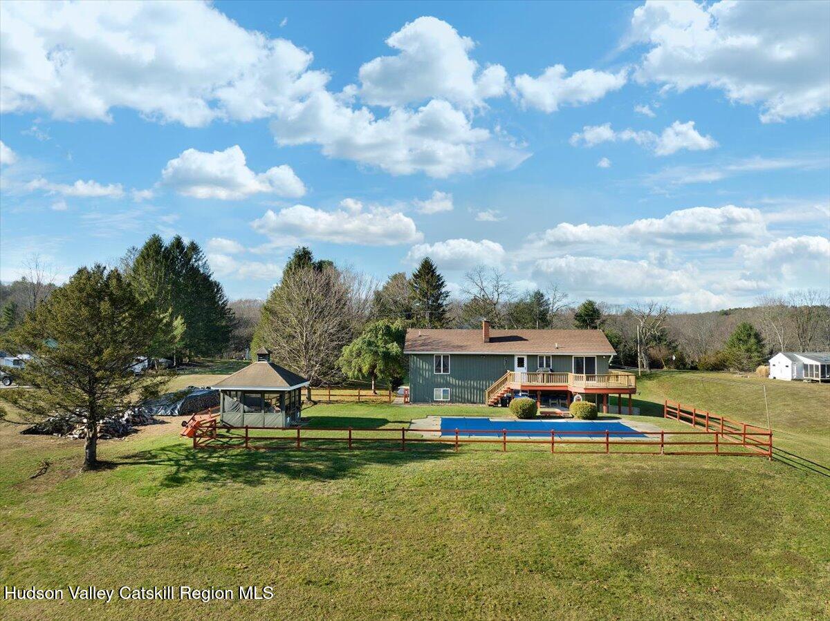 28 Hennett Road Valatie, NY 12184 - Photo 3 of 40 a aerial view of a house with swimming pool and big yard