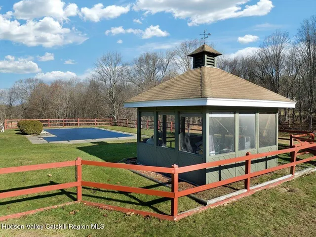 a view of a house with a big yard
