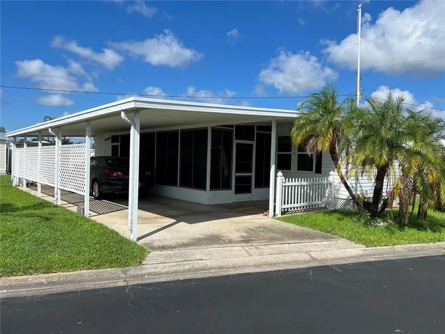 a house with yard in front of it