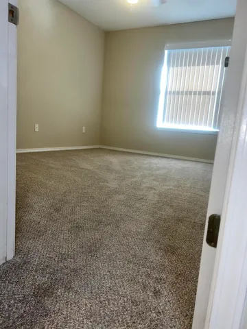 a bathroom with a sink a toilet and a shower