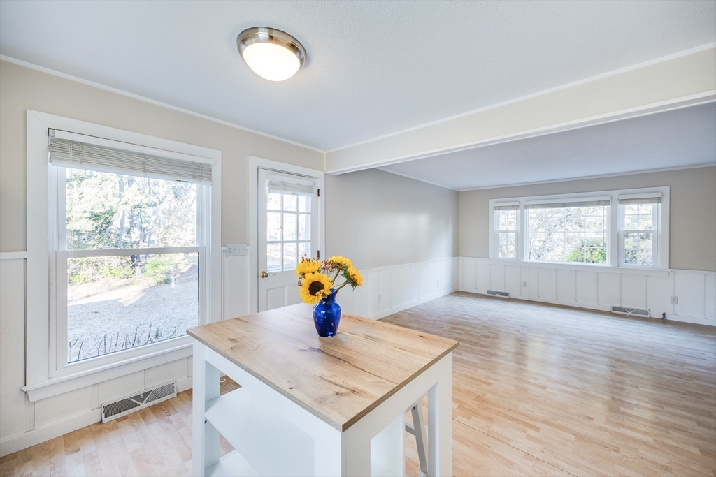 23 Malabar Road Chatham, MA 02633 - Photo 18 of 41 a view of a kitchen island wooden floor and window