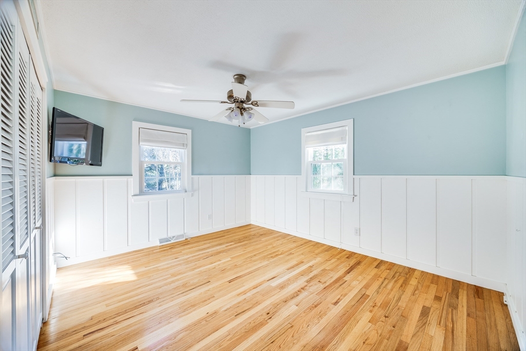 23 Malabar Road Chatham, MA 02633 - Photo 21 of 41 a view of empty room with wooden floor and fan
