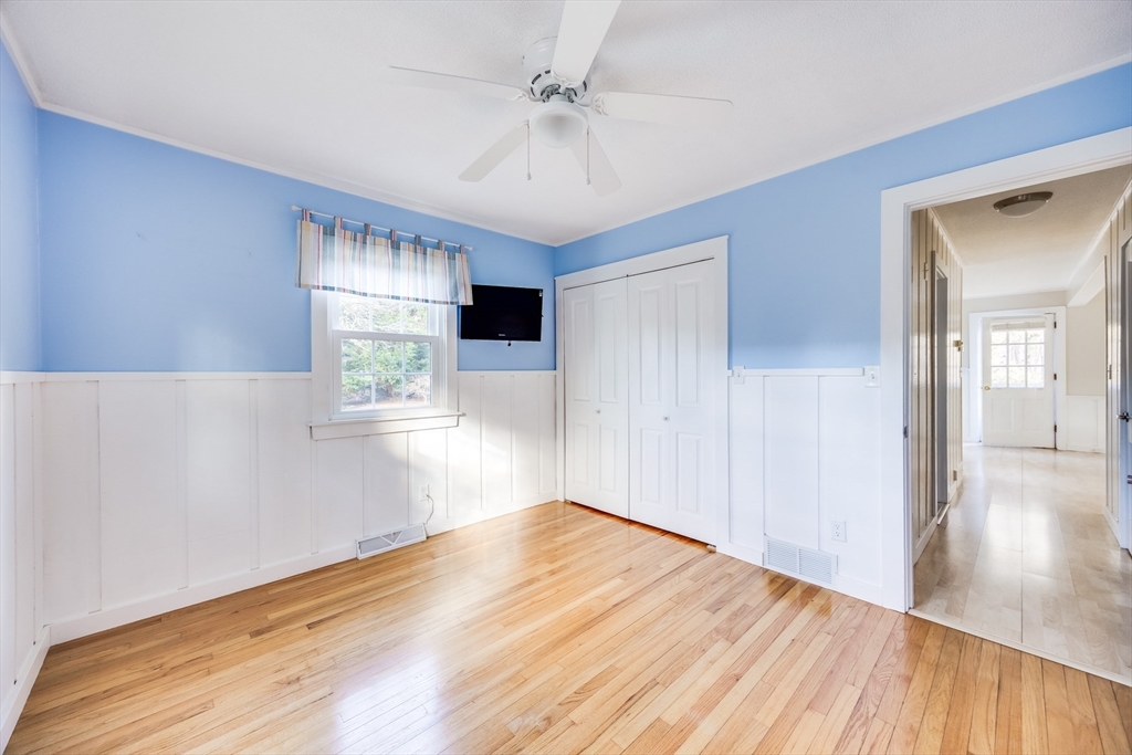 23 Malabar Road Chatham, MA 02633 - Photo 23 of 41 a view of empty room with wooden floor and fan