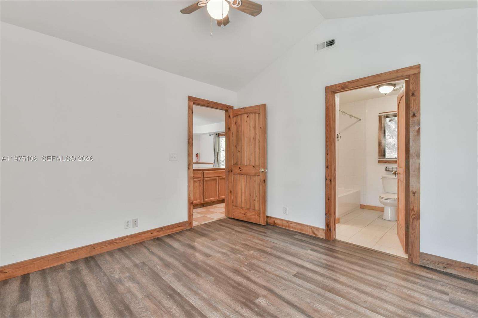 1216 Bugscuffle Road Hiawassee, GA 30546 - Photo 20 of 30 wooden floor in an empty room