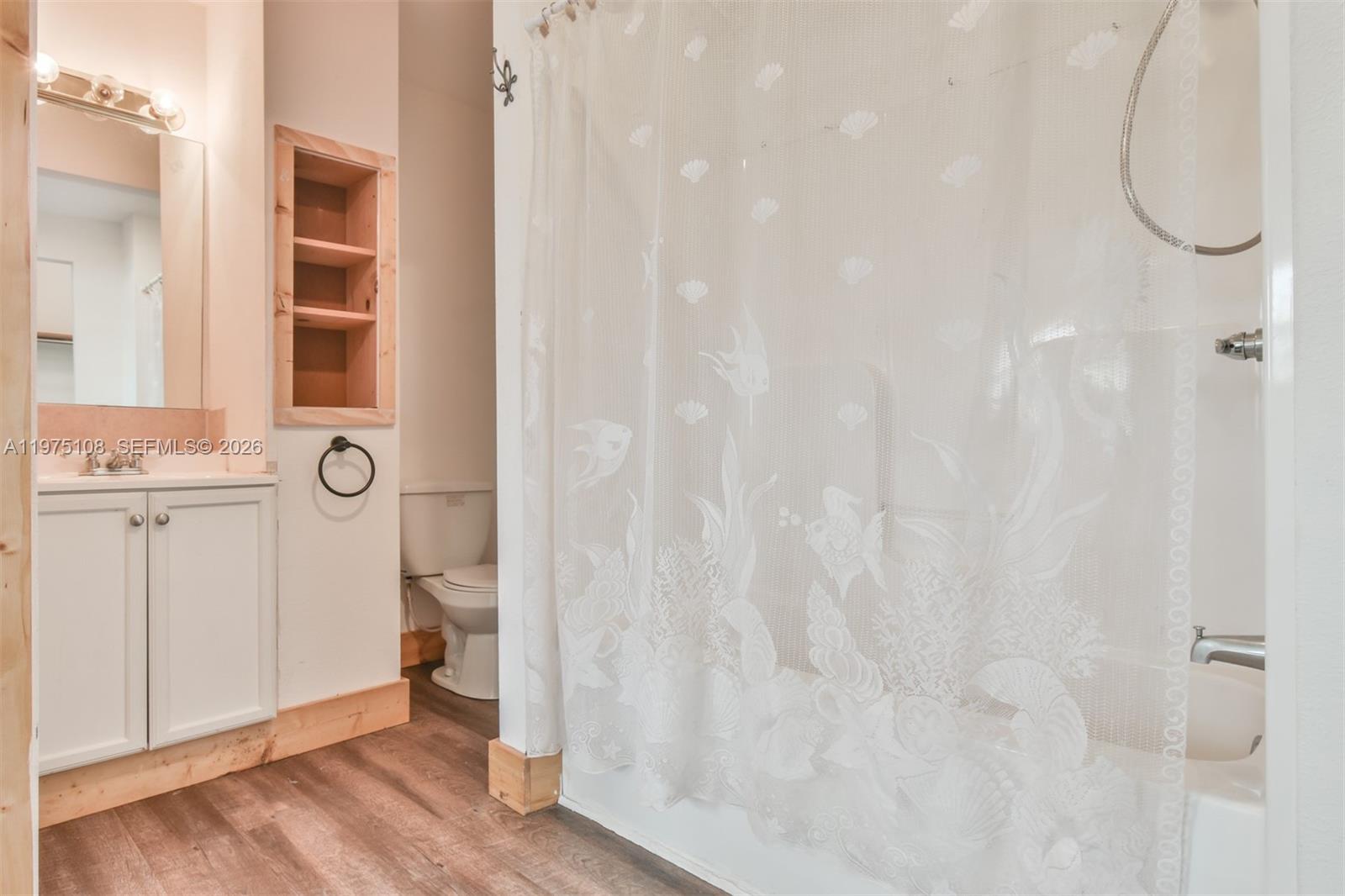 1216 Bugscuffle Road Hiawassee, GA 30546 - Photo 25 of 30 a bathroom with a toilet and a sink